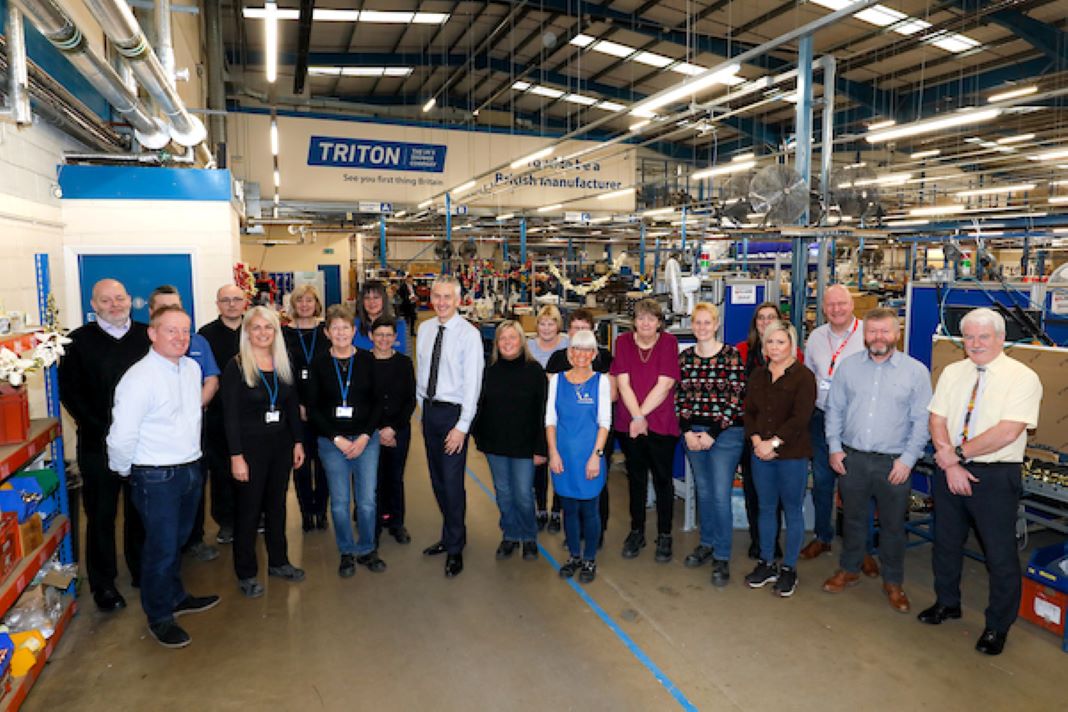 Triton Showers rewards team with 725 years of service Heating